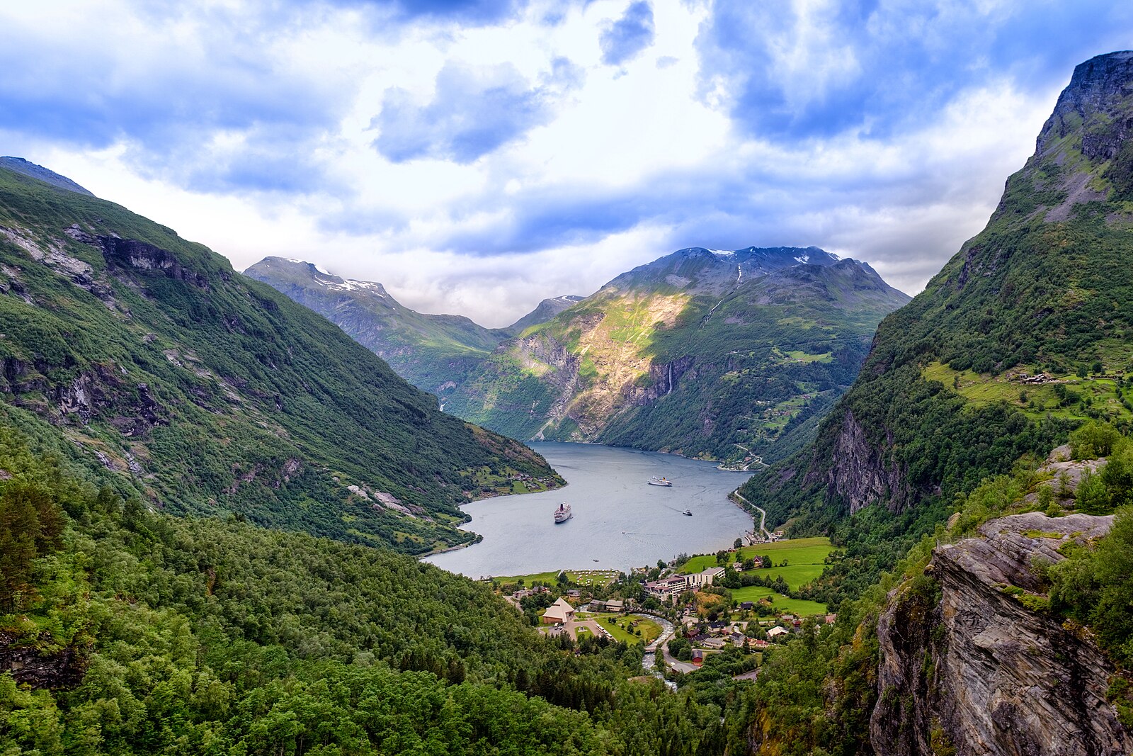 Geirangerfjord with cruise ship and steep cliffs, Norway